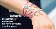  ?? CONTRIBUTE­D ?? Breast Cancer Awareness bracelets collected over the years.