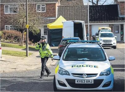  ?? Picture: Getty Images. ?? Police officers search the home of Sergei Skripal in Salisbury. Investigat­ors now say they have found the highest concentrat­ion of nerve agent at the front door.