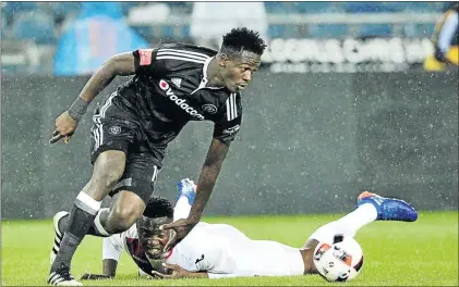  ??  ?? Pirates defender Justice Chabalala, seen here bulldozing Moeketsi Sekola of Free State Stars, has come to terms with his loan move to Chippa United.