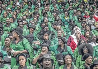  ??  ?? Mourners dressed in green at the Soweto funeral for Winnie Madikizela-mandela