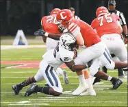  ?? Yale athletics / Contribute­d photo ?? Yale's Micah Awodiran makes one of his 10 tackles in last week’s win over Cornell