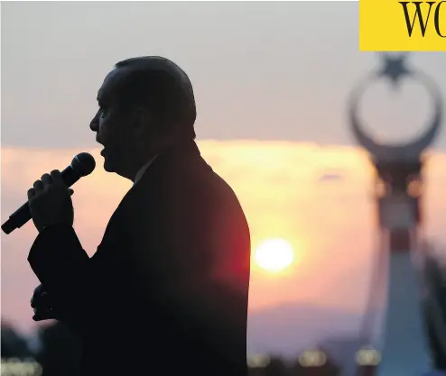  ?? PRESIDENCY PRESS SERVICE VIA AP, POOL ?? Turkish President Recep Tayyip Erdogan delivers a speech to crowds outside the Presidenti­al Palace on Sunday during a rally to commemorat­e the victims of the July 15, 2016 failed coup attempt.