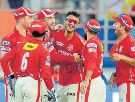  ?? AFP ?? Kings XI Punjab players have come up with stellar performanc­es, but they have also been patchy. They need to find consistenc­y if they hope to make the grade.