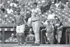  ?? AP Photo/John Minchillo ?? ■ New York Mets’ Jay Bruce stands at the plate after umpire Gabe Morales called an out on the Mets for batting out of order earlier in the first inning against the Cincinnati Reds on Wednesday in Cincinnati.