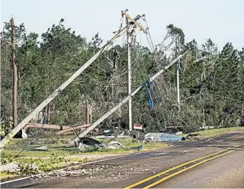  ?? BRETT COOMER/AP ?? Take time to prepare your financial and medical records for easy retrieval during storm and wildfire season.