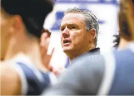  ?? HAYNE PALMOUR IV U-T ?? Brad Leaf, talking to his Foothills Christian players during a game against LJCD in 2020, is 15th on the San Diego all-time coaching wins list with 395.