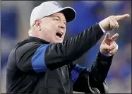  ?? File photo/AP ?? Kentucky coach Mark Stoops said the head football coaching job at Arkansas is a desirable position. “You have great tradition, you have support, you have financial backing,” he said. “Those are the critical things.”