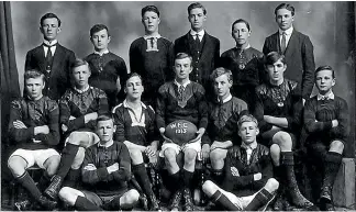  ??  ?? Back row fourth from left, Henry (Harry) Charles Gimblett, Invercargi­ll Corporatio­n clerk with the Waikiwi Football Club, who served as a gunner in World War 1 in France.