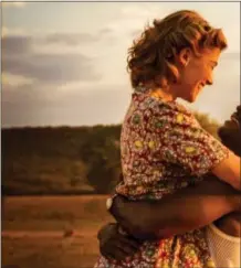  ?? PHOTO COURTESY OF FOX SEARCHLIGH­T PICTURES ?? Rosamund Pike as “Ruth Williams” and David Oyelowo as “Seretse Khama” in “A United Kingdom.”