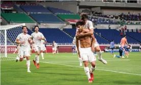  ??  ?? Marco Asensio celebrates his late winner for Spain in Saitama. Photograph: Daniela Porcelli/SPP/Shuttersto­ck