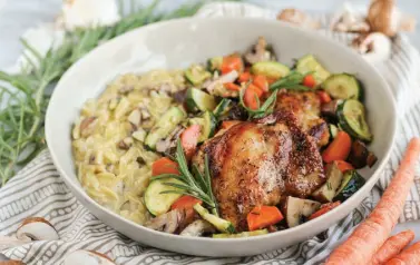  ??  ?? Roasted Chicken Thighs and Veggies with Mushroom Orzo Risotto