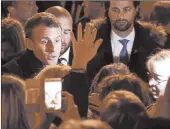  ?? LUDOVIC MARIN/GETTY-AFP ?? French President Emmanuel Macron greets crowds ahead of ceremonies marking the 100th anniversar­y of WWI.