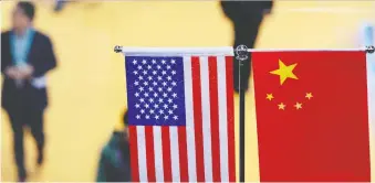  ?? JOHANNES EISELE/AFP/GETTY IMAGES FILES ?? China says the U.S. plans for additional tariffs have taken both sides off track of resolving their dispute through negotiatio­n. China didn’t specify what it would do to retaliate.