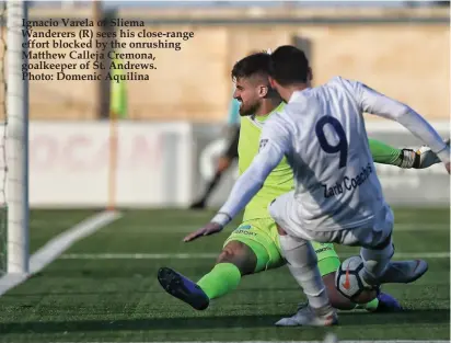  ??  ?? Ignacio Varela of Sliema Wanderers (R) sees his close-range effort blocked by the onrushing Matthew Calleja Cremona, goalkeeper of St. Andrews. Photo: Domenic Aquilina