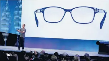  ?? Eric Risberg Associated Press ?? FACEBOOK’S Mark Zuckerberg says he expects VR headsets to one day shrink to the size of reading glasses.