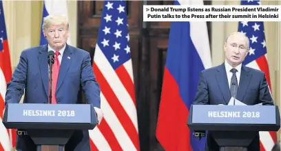  ??  ?? > Donald Trump listens as Russian President Vladimir Putin talks to the Press after their summit in Helsinki