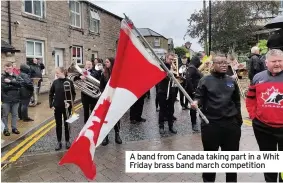 ??  ?? A band from Canada taking part in a Whit Friday brass band march competitio­n