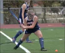  ?? STAN HUDY - SHUDY@DIGITALFIR­STMEDIA.COM ?? Saratoga Springs senior Molly Russell fires on the Shaker cage in the second half Friday in a Suburban Council contest on the newly installed Blue Bison turf.