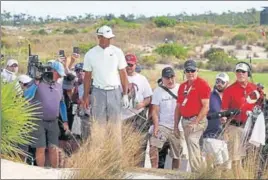  ?? AFP ?? Tiger Woods was placed tied-14 after the second round in Albany on Friday. ■