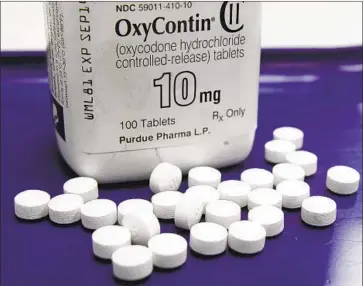  ?? Toby Talbot Associated Press ?? ALTHOUGH it wasn’t named in court documents in the Practice Fusion case, Purdue Pharma, the maker of OxyContin, is believed to be the drugmaker that paid the San Francisco firm to try to boost prescripti­ons.