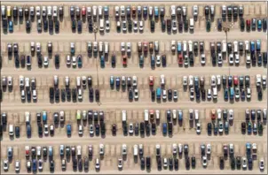  ?? VNA/VNS PHOTO ANH TUAN ?? Cars of German carmaker Volkswagen sit in a parking site at the company’s plant in Salzgitter, northern Germany, on July 19.
