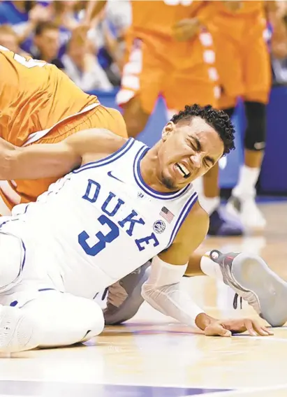  ?? GERRY BROOME/ASSOCIATED PRESS ?? Duke freshman Tre Jones injured his right shoulder Monday during his team’s loss against Syracuse.