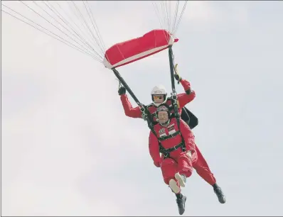  ??  ?? Chelsea pensioner Mike Smith undertakin­g his 100th parachute jump at Old Sarum Airfield in Salisbury, Wiltshire.