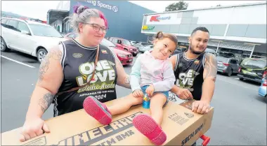  ?? PHOTO / MICHAEL CUNNINGHAM ?? Northland parents Jordan Pattison (left) and Vernon Forster, pictured with daughter Layla-Rei, 3, say they’re spending more carefully even on family events like birthdays and Easter amid the nation’s ongoing cost of living crisis.