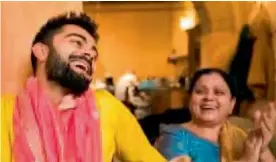  ??  ?? Virat Kohli with his mom Saroj Kohli