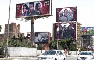  ??  ?? This file photo shows billboards for Ramadan TV series in the streets of the Egyptian capital Cairo.