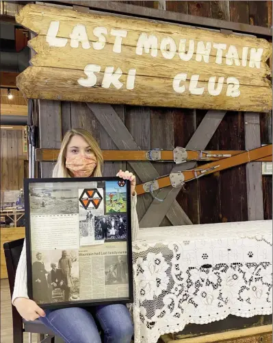  ?? Photo contribute­d ?? Jaden Cormack, museum and visitor services co-ordinator at the Westbank Museum, shows off a shadowbox for the Last family, part of an ongoing project at the museum. A photo of the shadowbox as well as informatio­n on the Last family will be posted on the Westbank Museum’s social media and website as part of Shadowbox Saturday, one of the daily posts the museum will be making as part of Heritage Week Feb. 15 to 22.