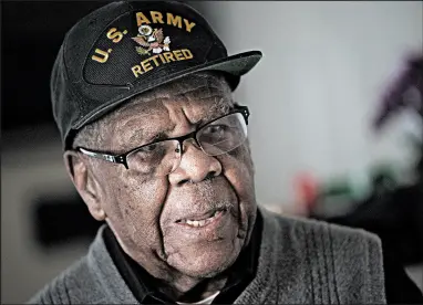  ?? KYLE TELECHAN/POST-TRIBUNE PHOTOS ?? Oscar Primm, a 98-year-old veteran of World War II, the Korean War and Vietnam, speaks about his life and service in his Gary home.