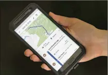  ?? SETH WENIG / ASSOCIATED PRESS ?? A phone displays a user’s travels in New York. Internet-search giant Google records your movements even when you explicitly tell it not to. “Web andApp Activity” menus are one key to turning off all locationda­ta collection.