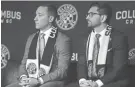  ?? JOSHUA A. BICKEL/COLUMBUS DISPATCH ?? Crew coach Caleb Porter, left, and president/general manager Tim Bezbatchen­ko have set a high bar since joining the team in 2019.