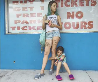  ??  ?? TroUBleS: Single-mom halley (Bria Vinaite) and daughter Moonee (Brooklynn Prince) struggle to survive in ‘The Florida Project.’ Willem dafoe and Prince, top right.