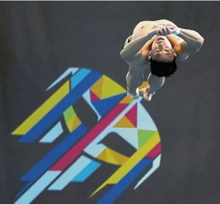  ??  ?? Golden plunge: Ooi Tze Liang in action during the 10m platform final at the National Aquatic Centre in Bukit Jalil yesterday.