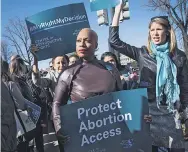  ?? JACK GRUBER/ USA TODAY ?? Rep. Ayanna Pressley, D- Mass., walks to the Supreme Court with other members of Congress as abortion rights activists rally in Washington on March 4.