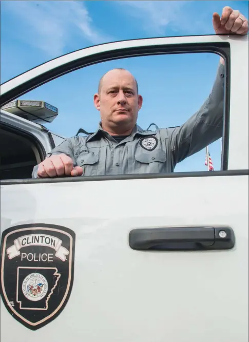 ?? WILLIAM HARVEY/RIVER VALLEY & OZARK EDITION ?? Sgt. Jay Murdock of the Clinton Police Department was named Van Buren County Outstandin­g Law Enforcemen­t Officer of the Year by Arkansas Attorney General Leslie Rutledge. An Air Force veteran, Murdock became a sheriff’s deputy when he got out of the...