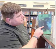  ?? (Courtesy Photo/Daniel Bereznicki) ?? Jeremy Smith, a young author who attended Pea Ridge High School, hopes to see his books on shelves next to those of his inspiratio­ns, Stephen King and Michael Crichton.