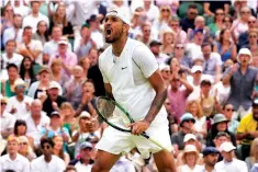  ?? The Associated Press ?? ■ Australia’s Nick Kyrgios reacts after winning a point against Brandon Nakashima of the US in a men’s singles fourth round match on day eight of the Wimbledon tennis championsh­ips in London Monday.