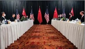  ?? (AP/Frederic J. Brown) ?? Secretary of State Antony Blinken (second from right), joined by national security adviser Jake Sullivan (right), speaks while meeting Thursday with Chinese foreign affairs chief Yang Jiechi (second from left) and Chinese State Councilor Wang Yi (left) in Anchorage, Alaska.