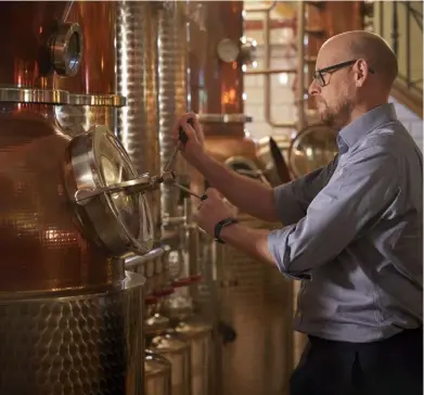  ??  ?? Whitley Neill founder Johnny Neill, above, monitors production at the City of London distillery