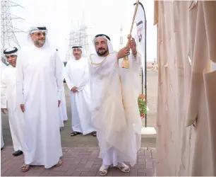  ??  ?? dr sheikh sultan bin Mohammed al Qasimi during the launching ceremony of the 89-km Khor fakkan road project. right, a scenic hajar Mountains is seen in the backdrop of the venue of the event.