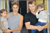  ?? AFP ?? David Warner with wife Candice and daughters.