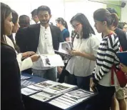  ??  ?? Attendees exploring career options at ATC’s Legal Careers Fair 2016.