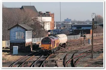  ??  ?? One of the last small-scale wagonload flows via the Channel Tunnel was chlorodifl­uormethane from Runcorn, which for a time was loaded on to rail at Widnes. 67028 passes Arpley Junction box with the 1010 Widnes-Warrington Arpley trip working on February 12 2008.