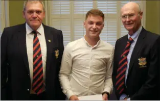  ??  ?? Kieran Tracy, winner of the 2018 Club Championsh­ip at County Louth Golf Club, with Captain Pat McCabe and President Neil Matthews.