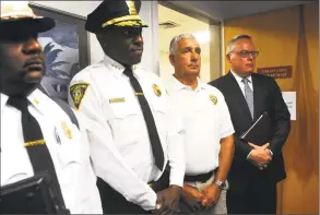  ?? Ned Gerard / Hearst Connecticu­t Media ?? Jim Carroll, far right, acting Deputy Director of the White House Office of National Drug Control Policy stands with, from left, New Haven Fire Chief John Alston, New Haven Police Chief Anthony Campbell and New Haven Director of Emergency Operation Rick Fontana during a press conference following a meeting with state and city officials at the Connecticu­t Mental Health Center, in New Haven on Monday.