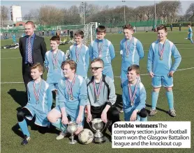  ??  ?? Double winners The company section junior football team won the Glasgow Battalion league and the knockout cup