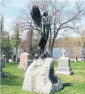  ?? TRENT VALLEY ARCHIVES ?? According to local lore, the head of the “Black Angel” statue in Peterborou­gh’s Little Lake Cemetery turns at night.